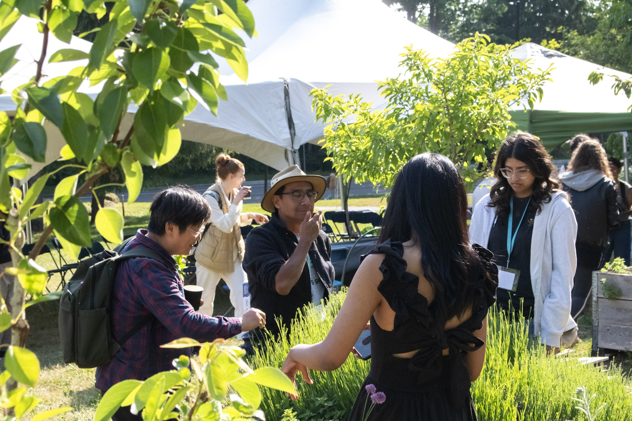 Multiple people in agreen garden